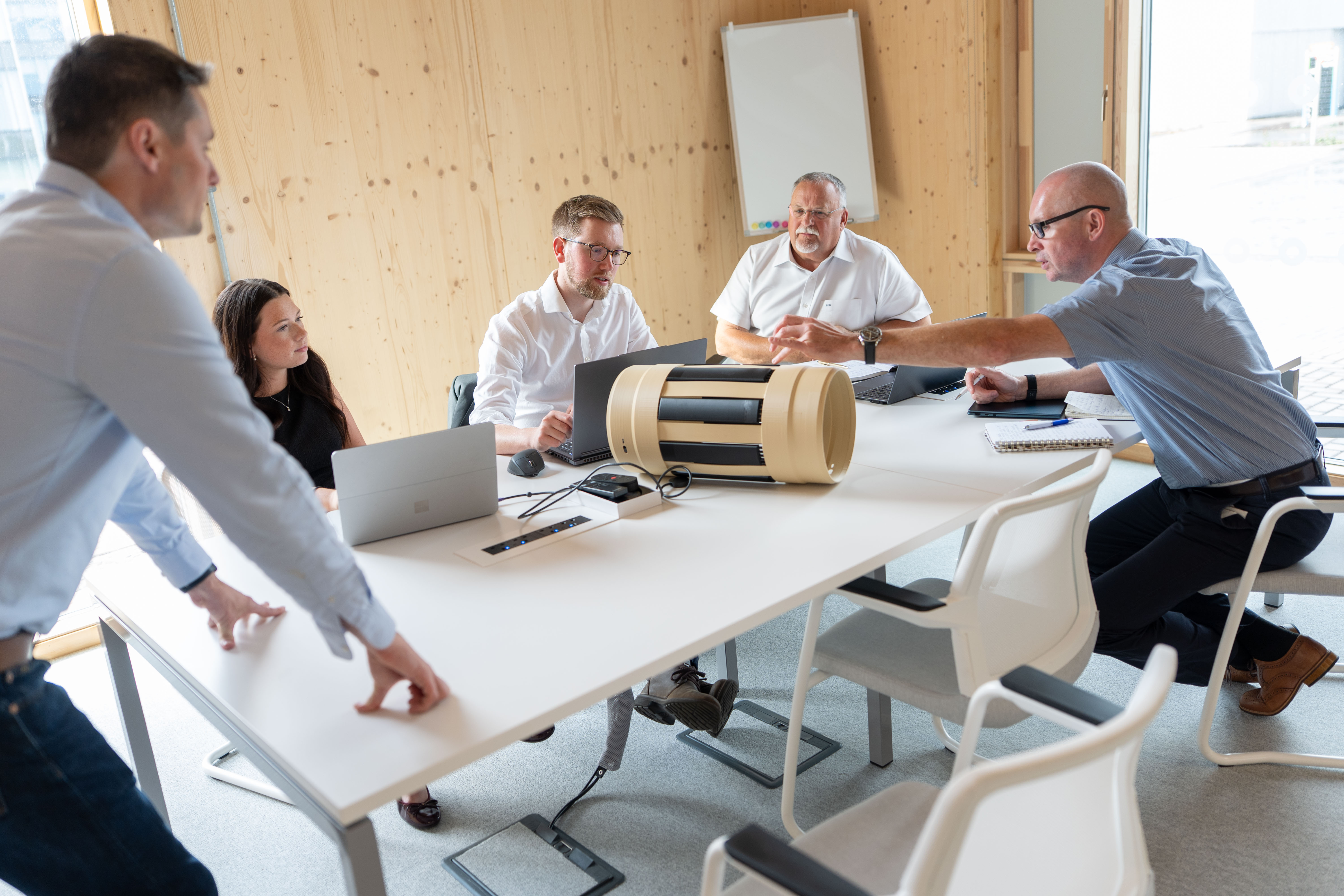 CenterSet team reviewing the centralizer prototype in the ETZ facility